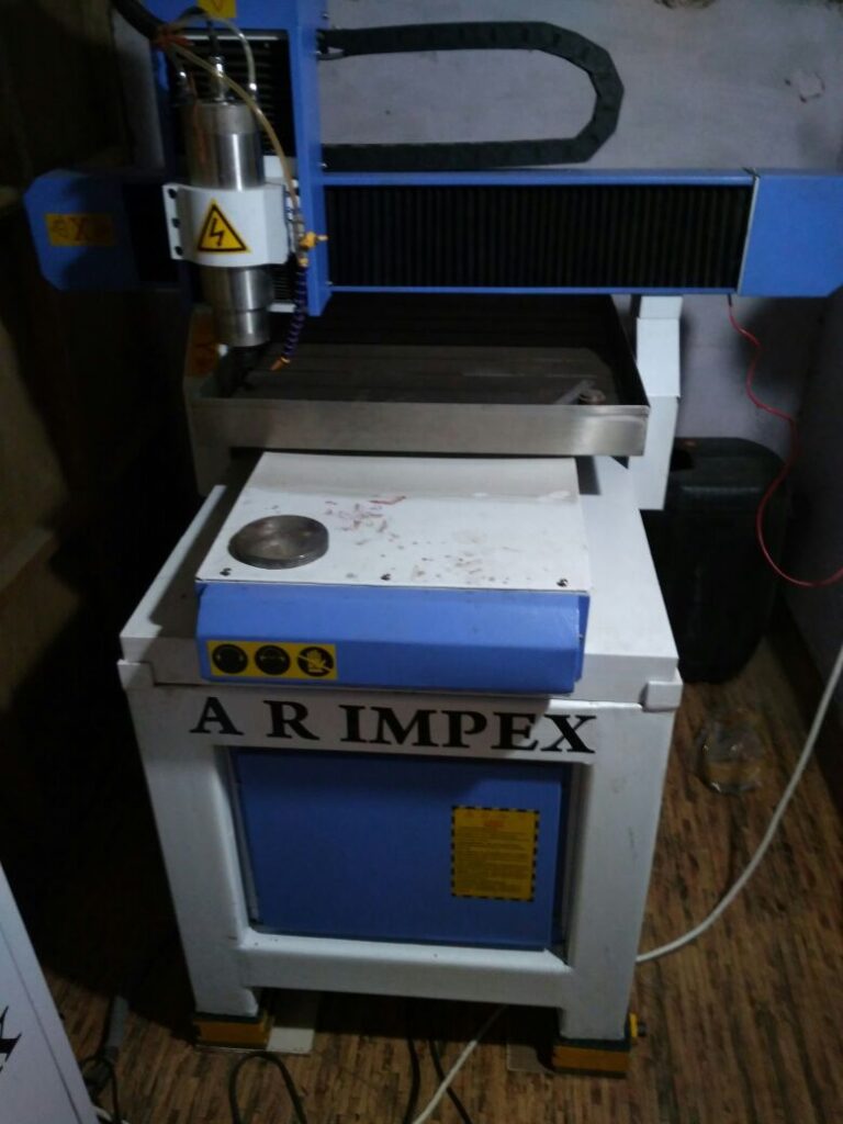 CNC Engraving Machine on Wedge Mounts